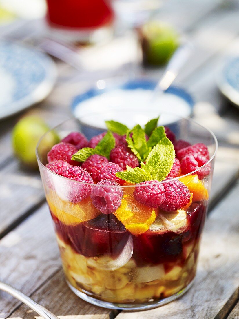 Summery fruit compote with raspberries