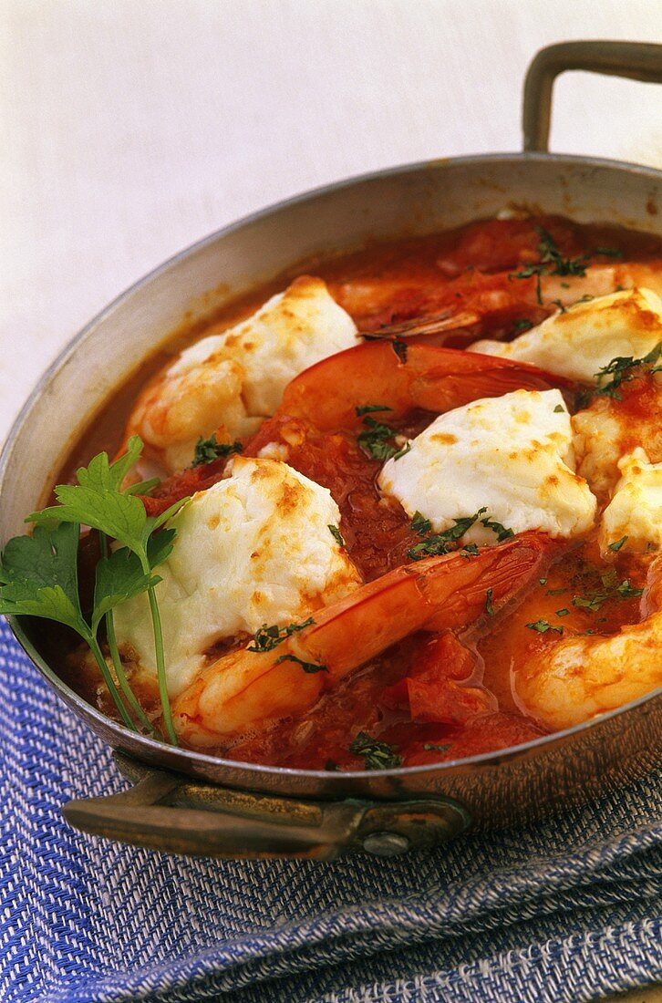 Fish, king prawn and tomato casserole
