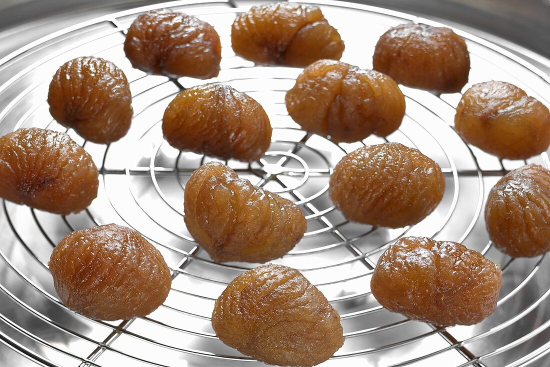Candied chestnuts on cake rack