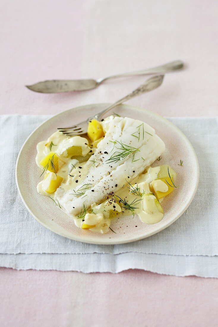 Cod with cooked cucumber and potato