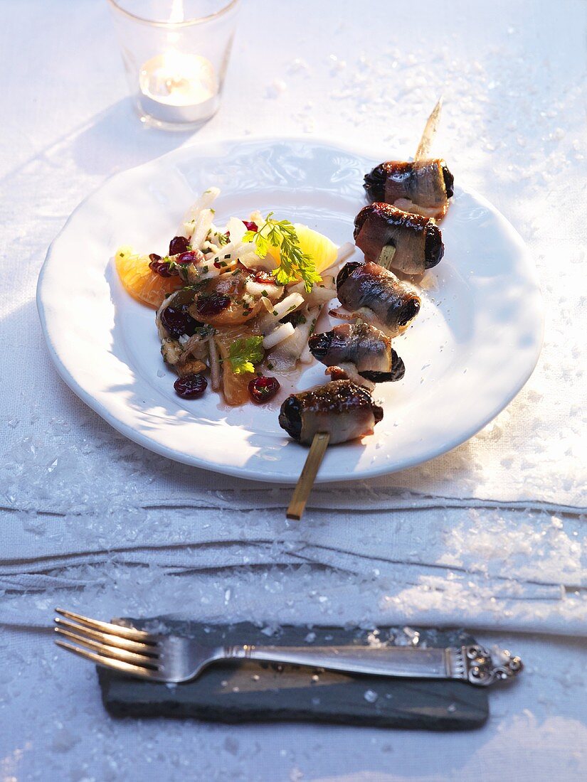Apple and celeriac salad with barbecued plum skewers