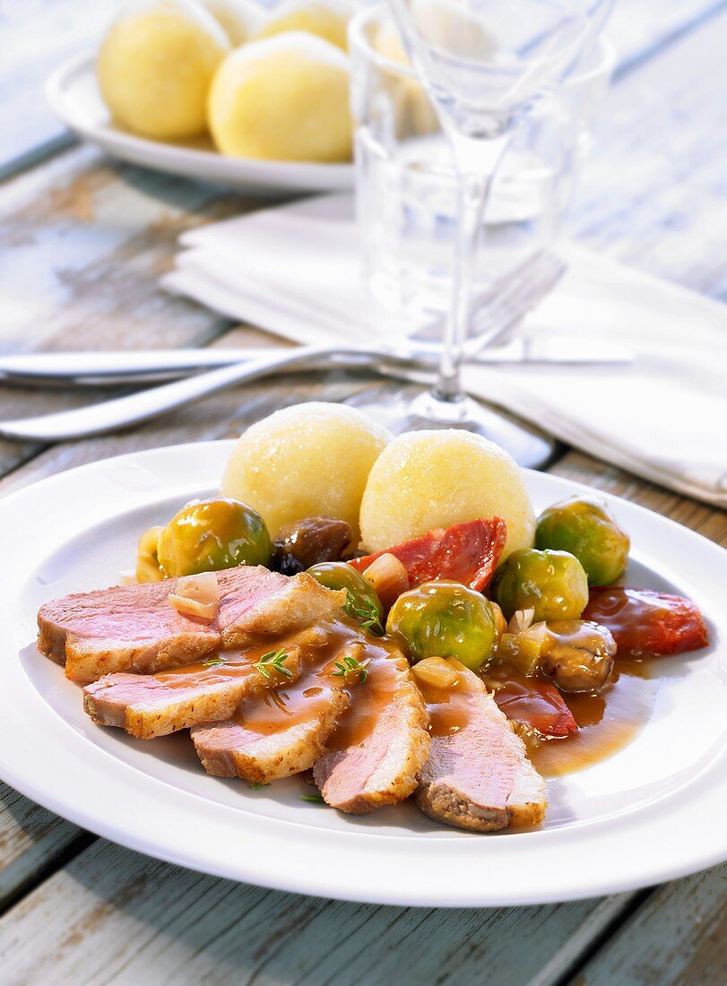 Roast duck breast with chestnuts and Brussels sprouts