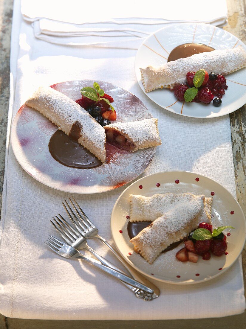 Sweet calzone with lemon grass and chocolate sauce