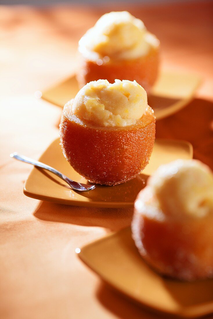 Orange ice cream in hollowed-out oranges