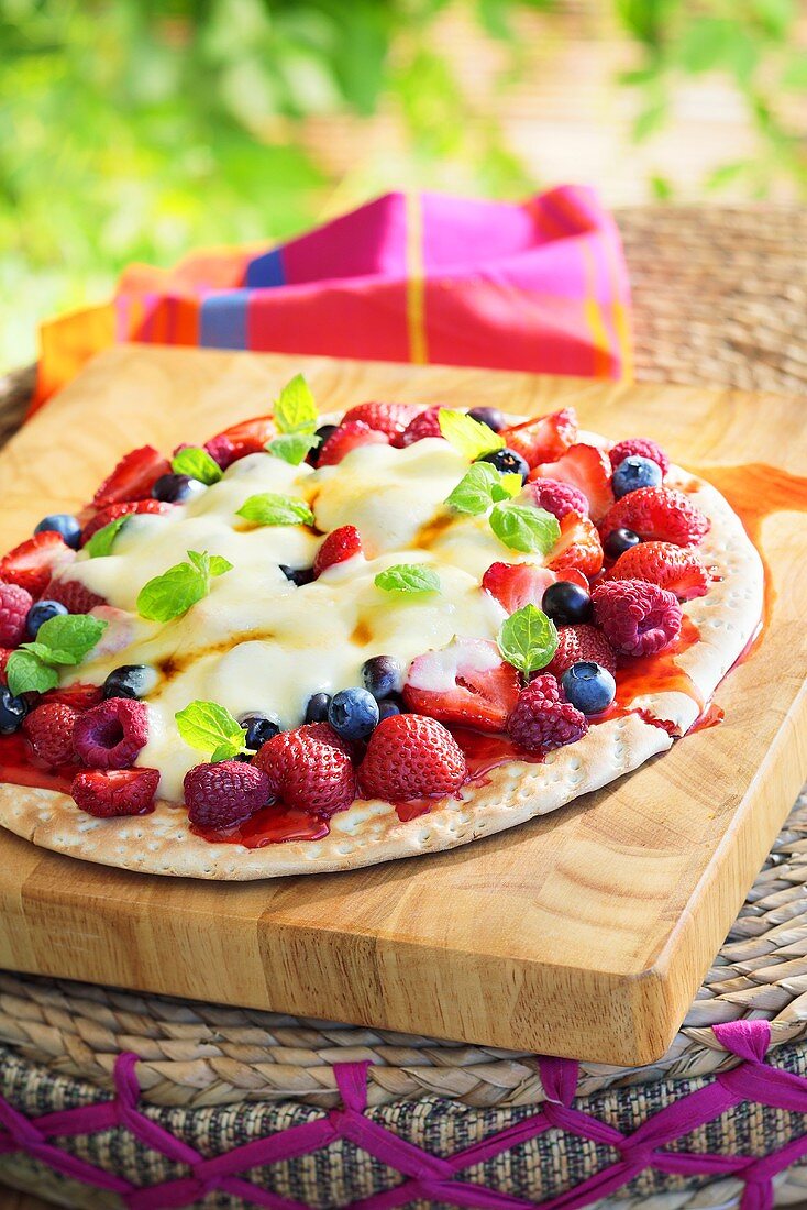 Sweet berry pizza with custard
