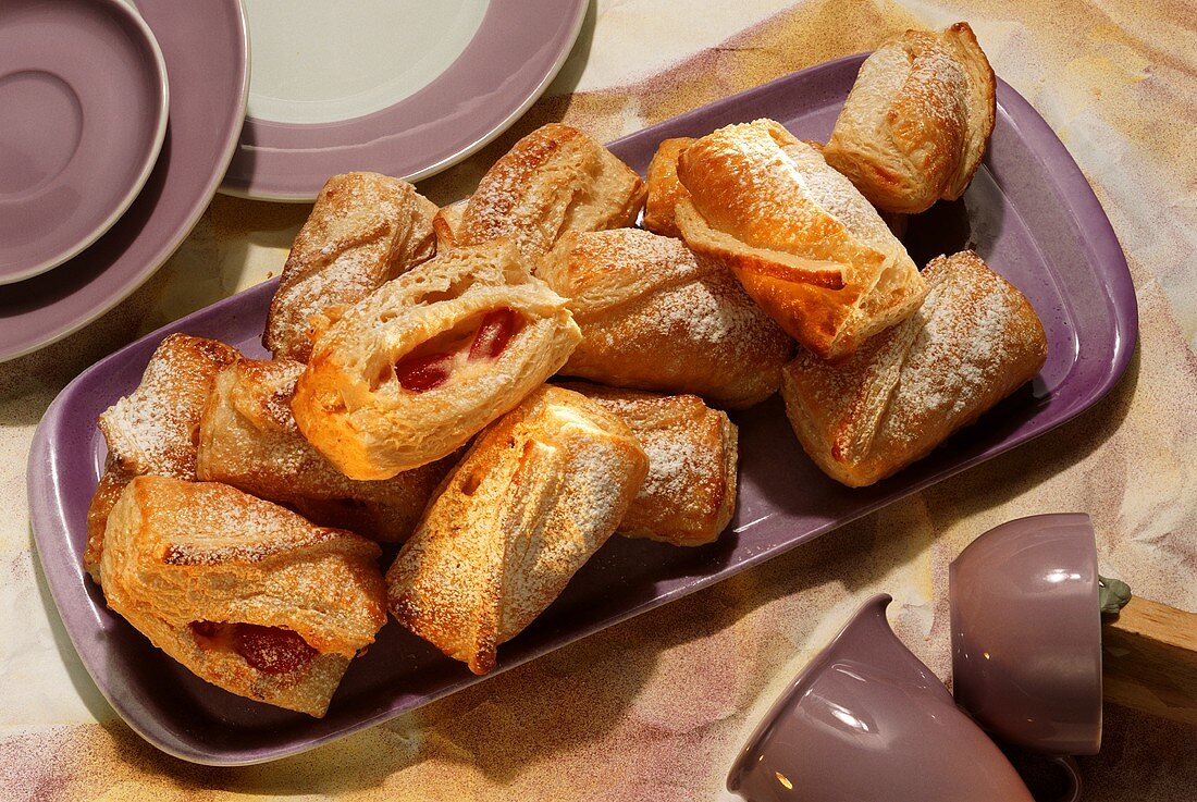 Cockscombs (yeast pastries) with quark and marzipan