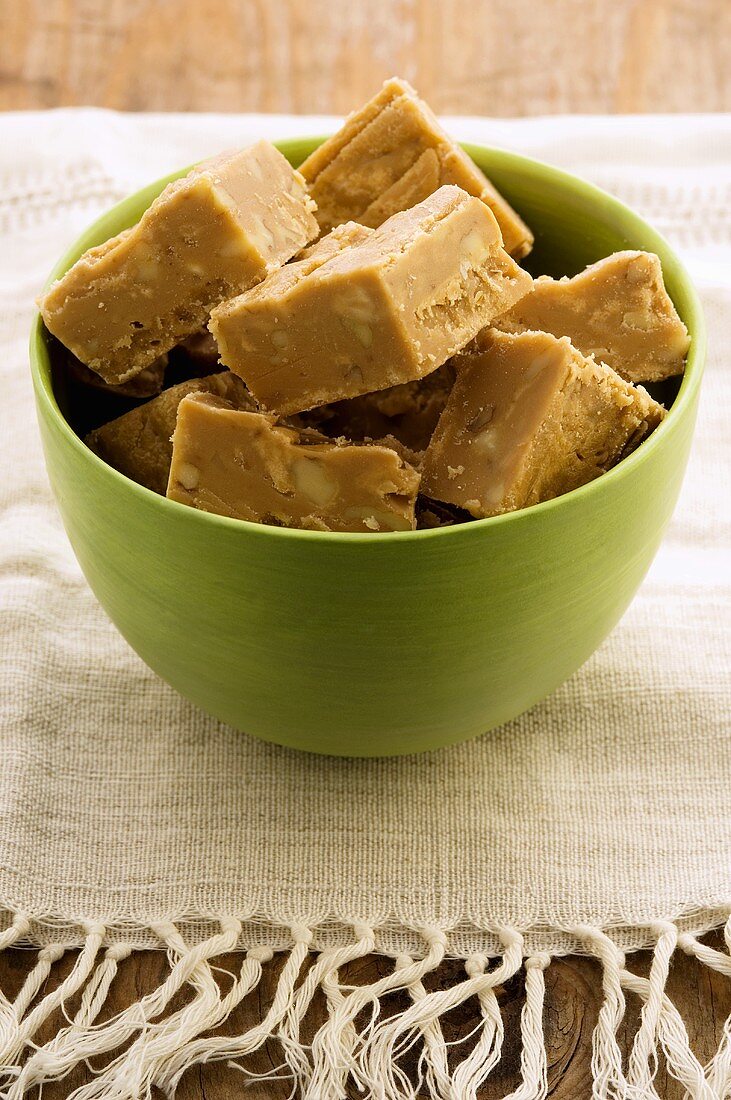 Caramel fudge in green bowl