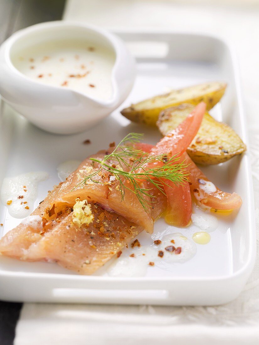 Marinated huchen (Danube salmon) with elderflower buttermilk foam