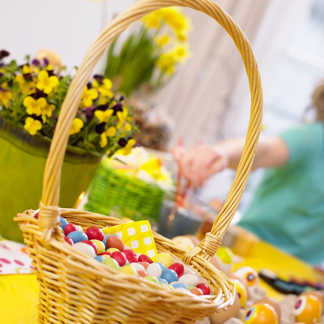 Basket of coloured sugar eggs