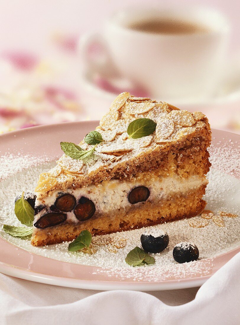 Herrschaftstorte (blueberry cream cake with flaked almonds)