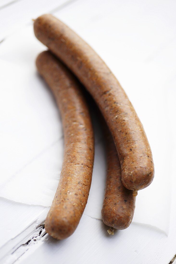 Three merguez sausages (spicy sausages from North Africa)