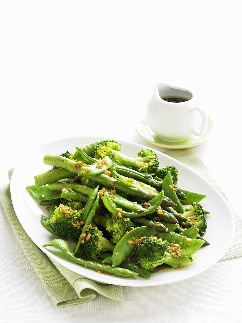 Steamed green vegetables with ginger, soy sauce