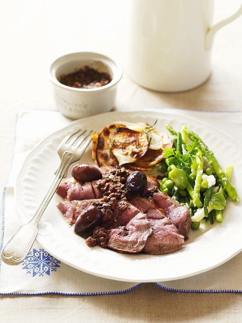 Lamb with vegetables and tapenade