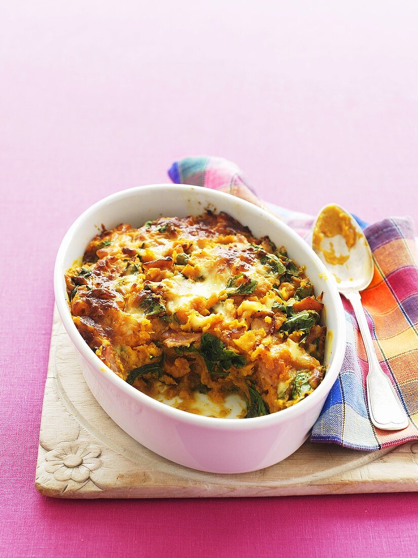 Sweet potato and spinach bake in baking dish