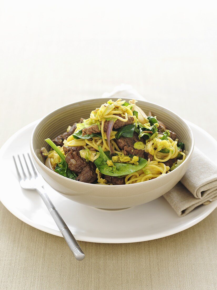 Asian beef with ginger, sprouts and noodles
