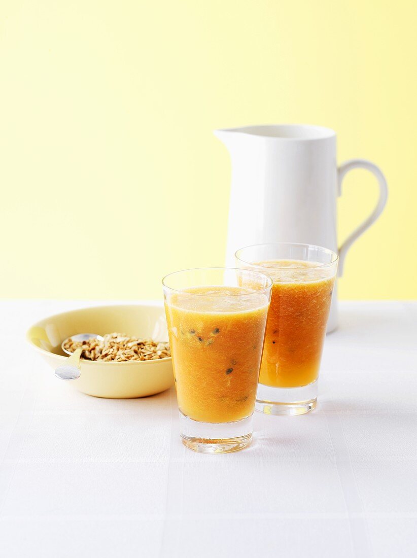 Passionfruit and papaya juice with muesli