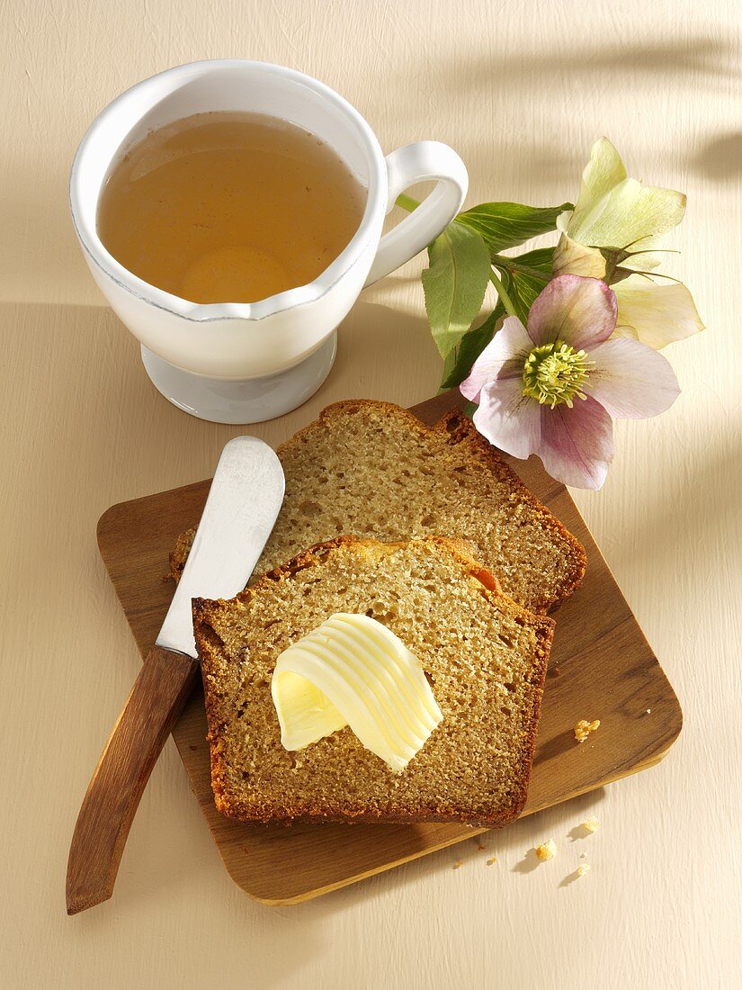 East Frisian honey cake with butter, cup of tea