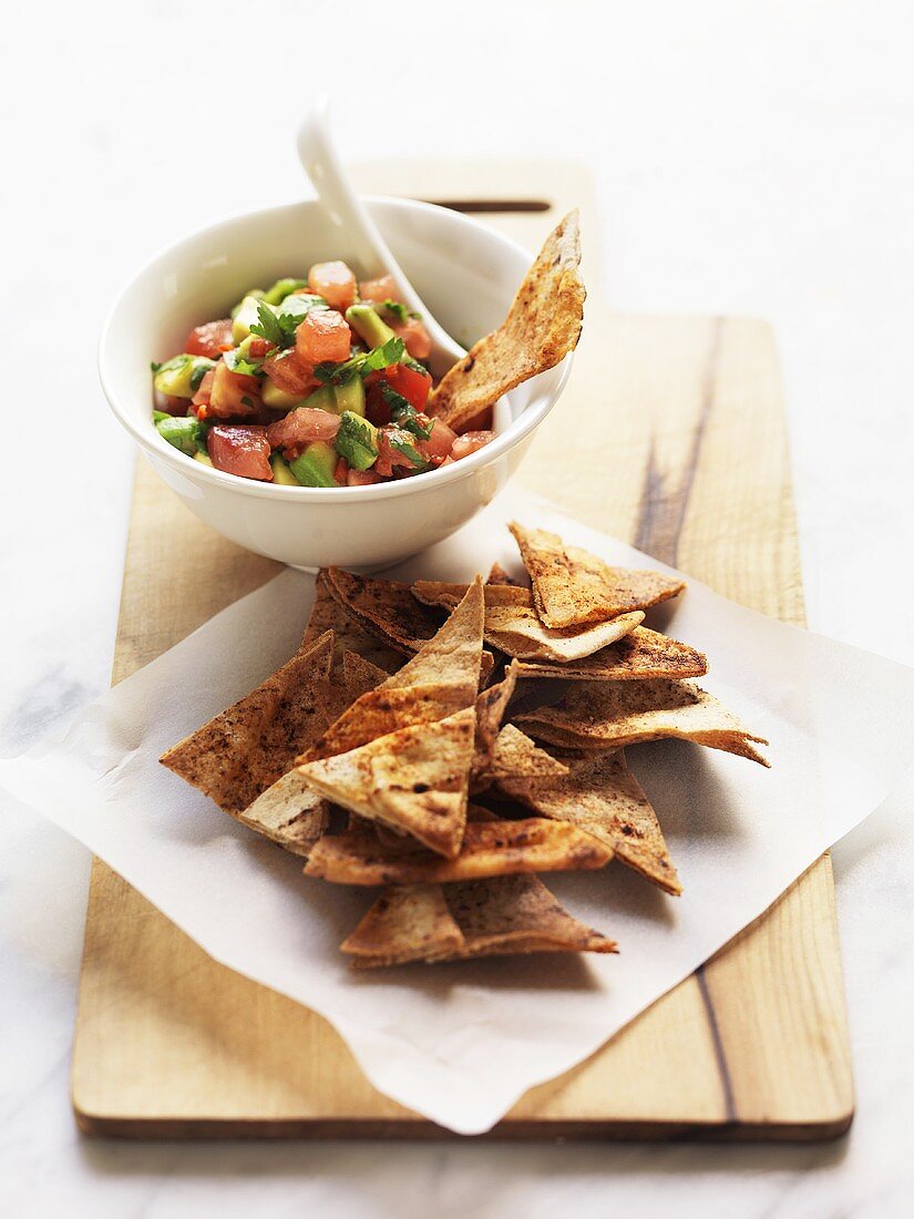 Tomato and avocado salsa with pita chips