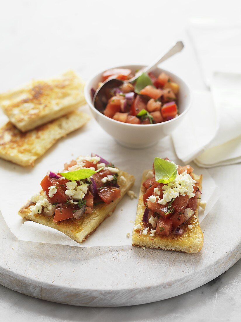 Flatbread topped with tomato salsa and feta