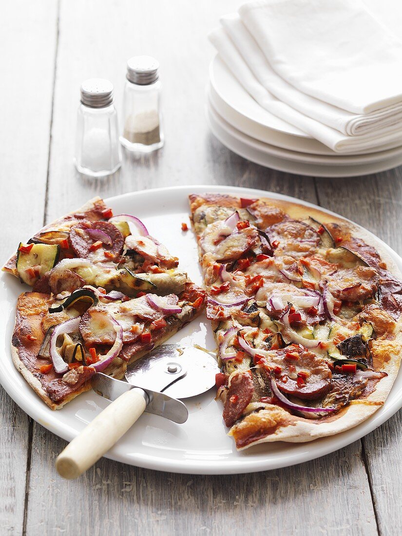 Salami and grilled vegetable pizza