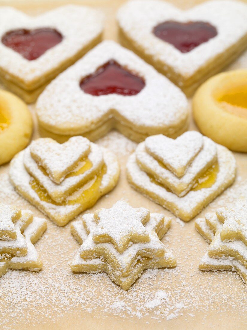Assorted jam biscuits with icing sugar