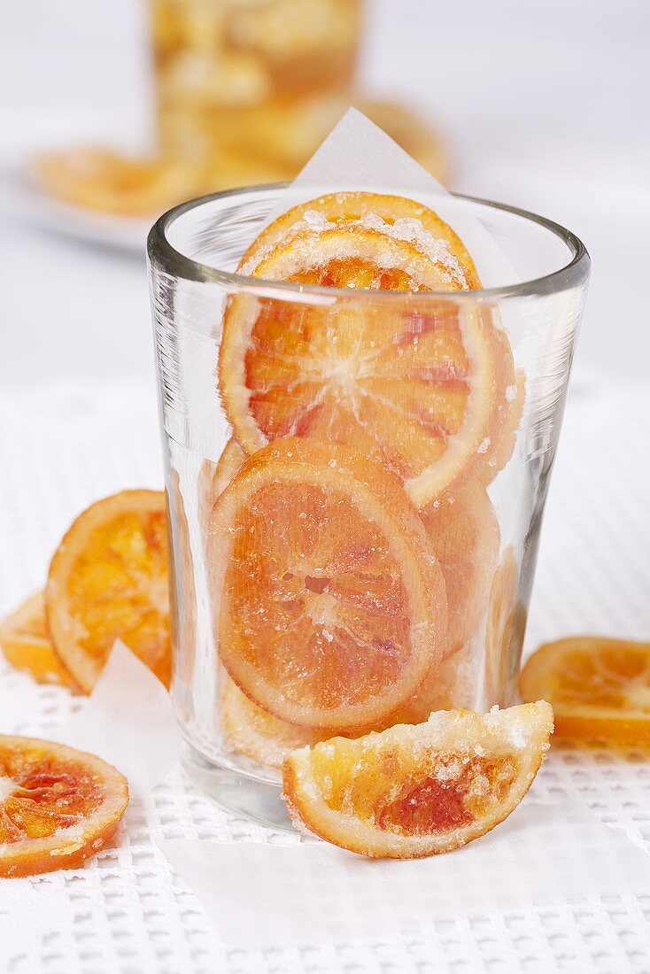 Candied orange slices in glass