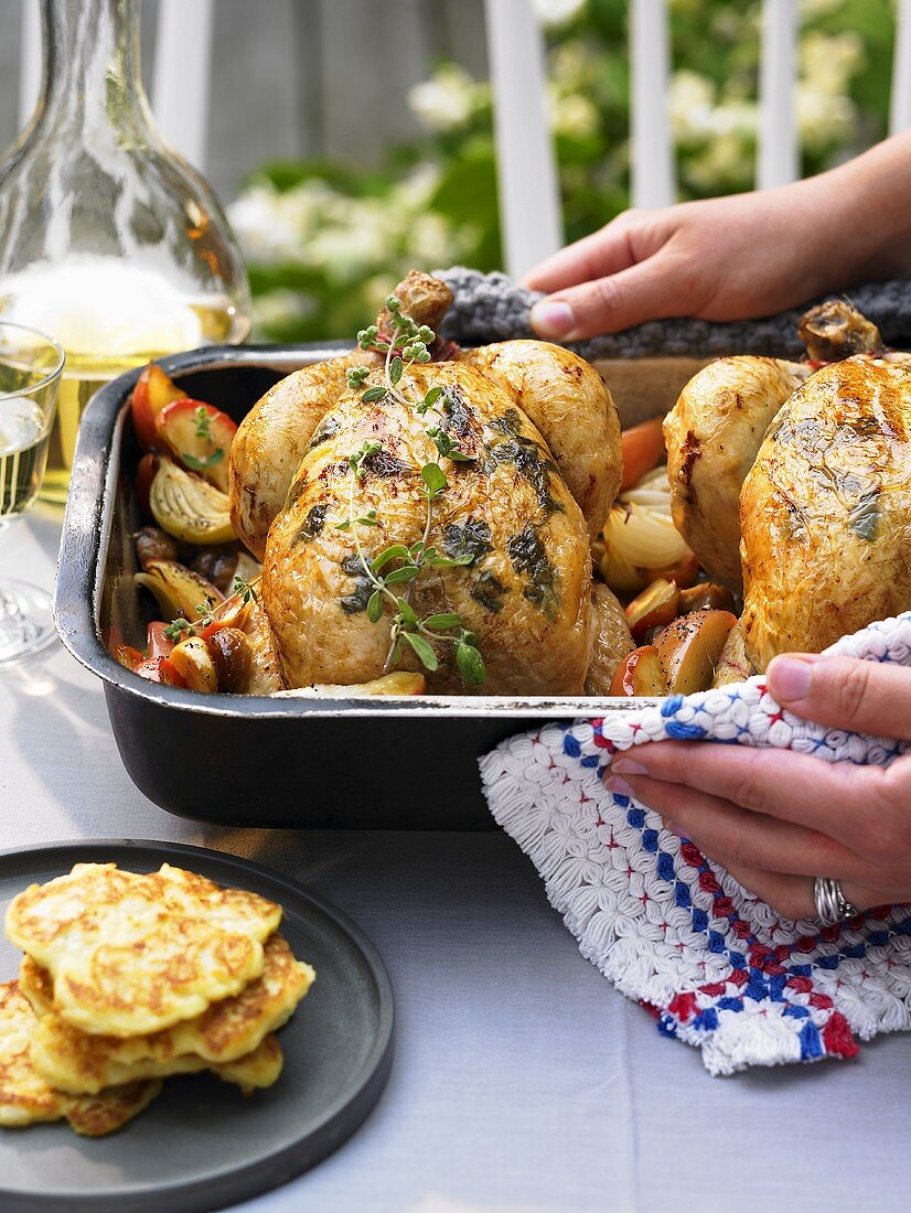 Chicken with apples and chestnuts and potato pancakes