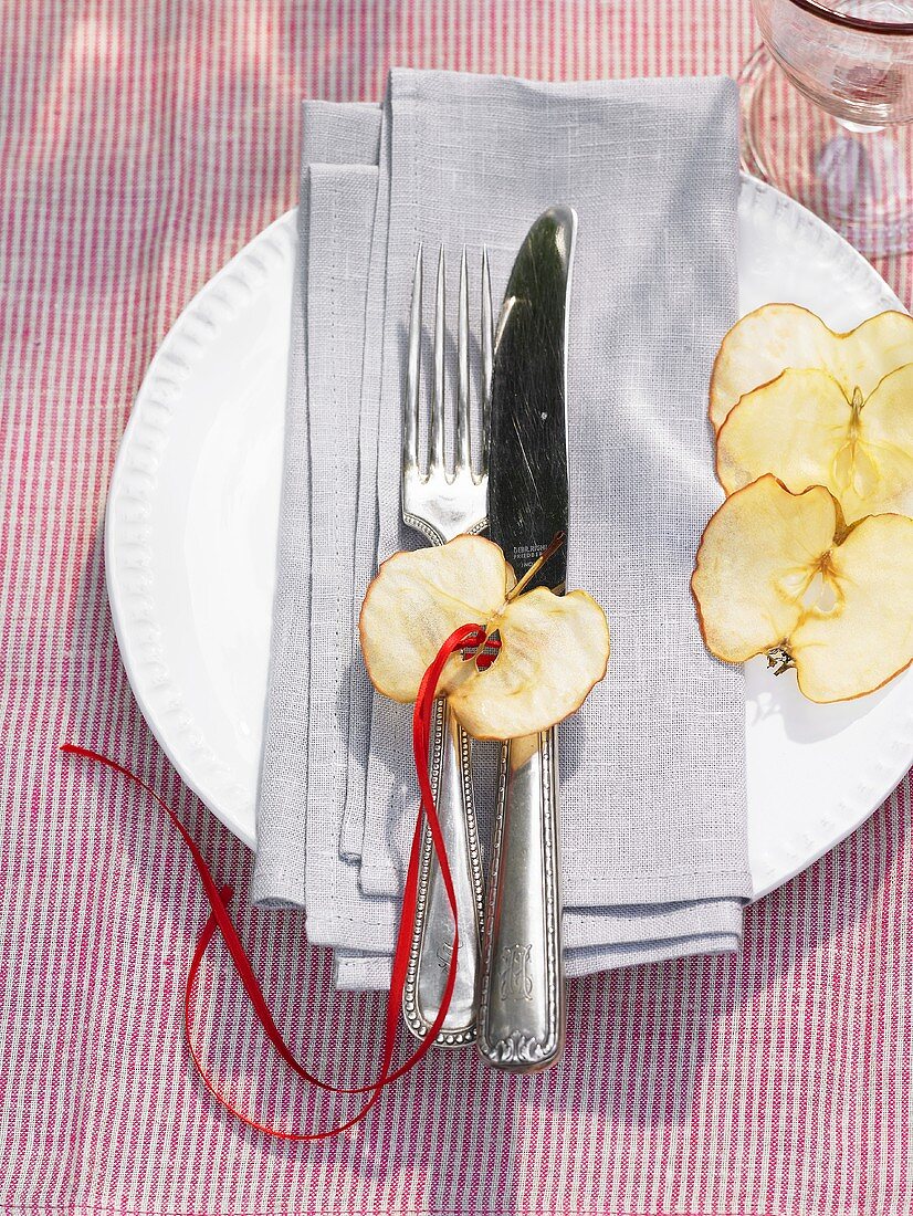 Place-setting with apple decoration