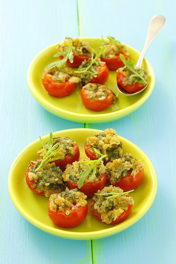 Stuffed cherry tomatoes with rocket pesto