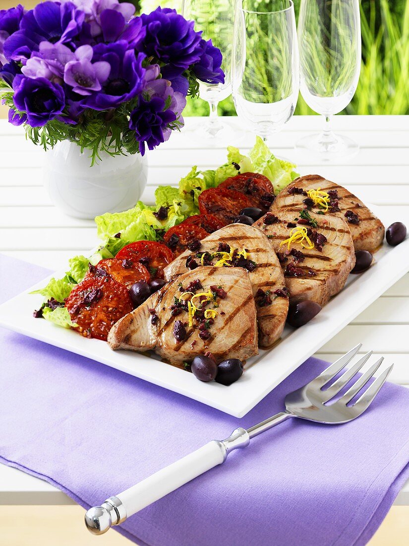 Grilled tuna steaks with tomato salad
