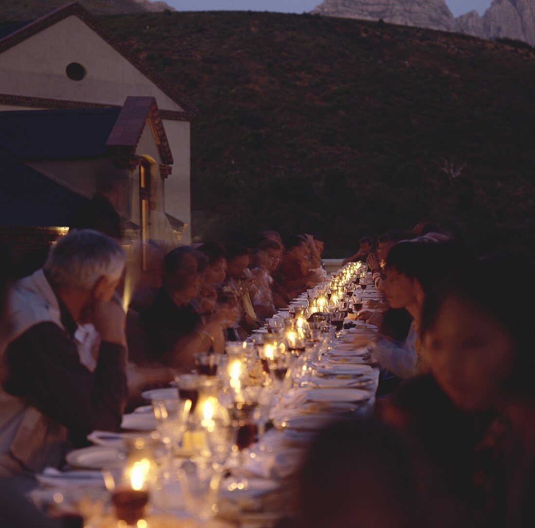 People at table with wine, Neil Ellis Wines, Stellenbosch