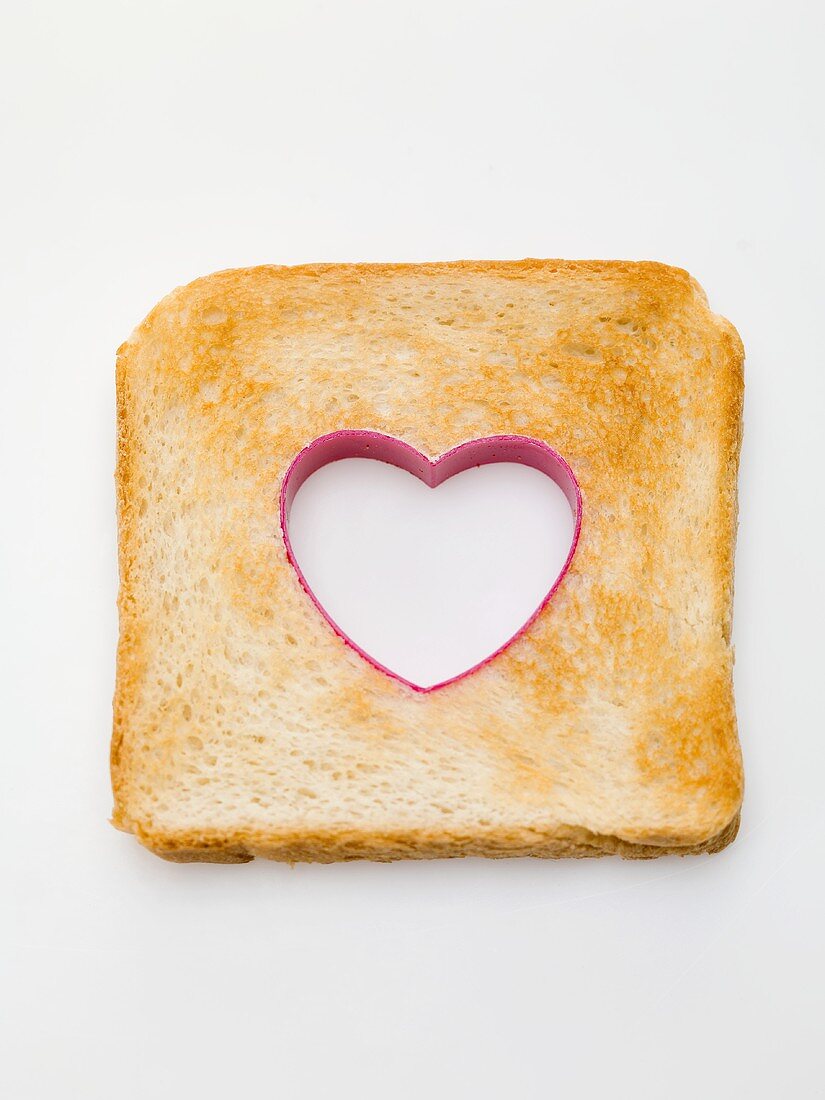 Slice of toast with a heart cut out