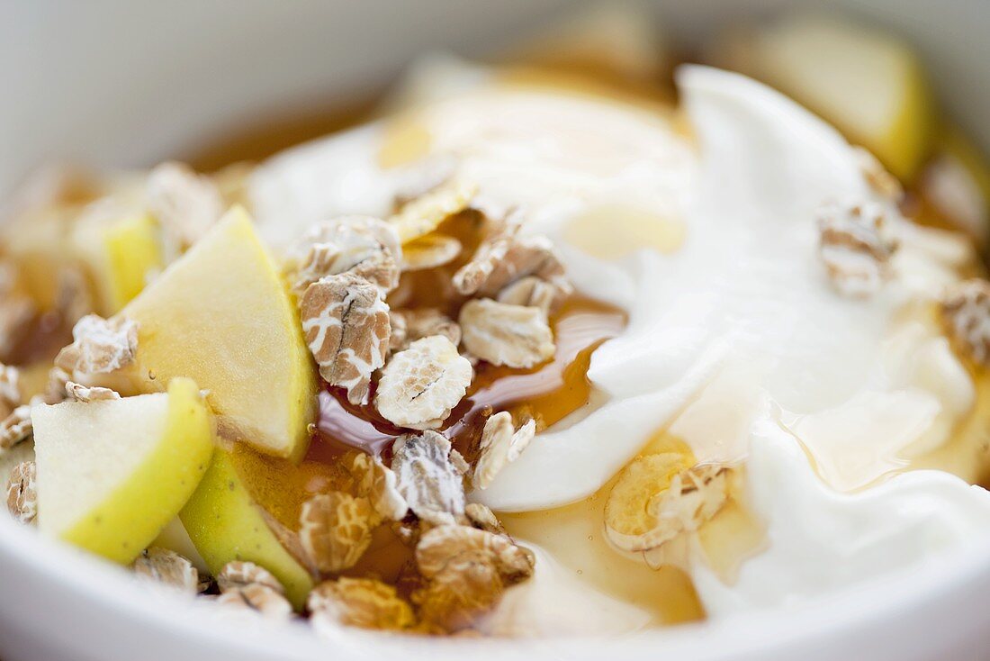 Yoghurt with muesli, honey and apple
