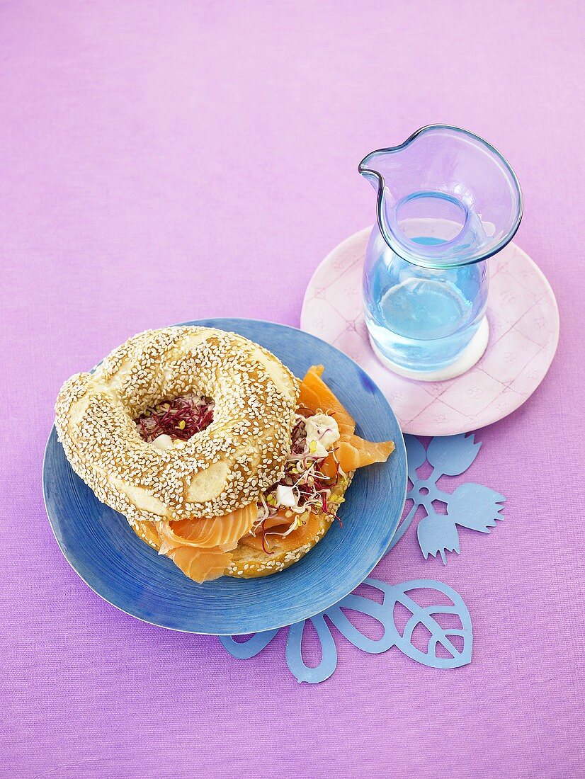 Sesame bagel filled with smoked salmon