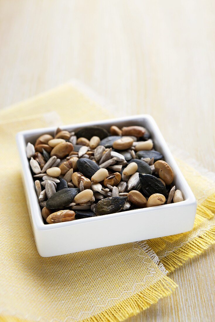 Assorted seeds in small dish