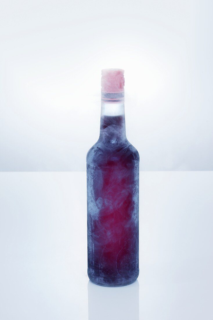 Amaro herbal liqueur in icy bottle