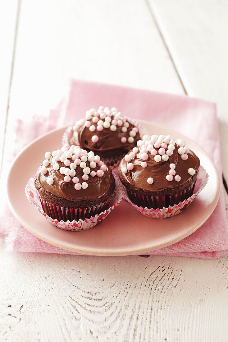 Chocolate cupcakes with sugar pearls