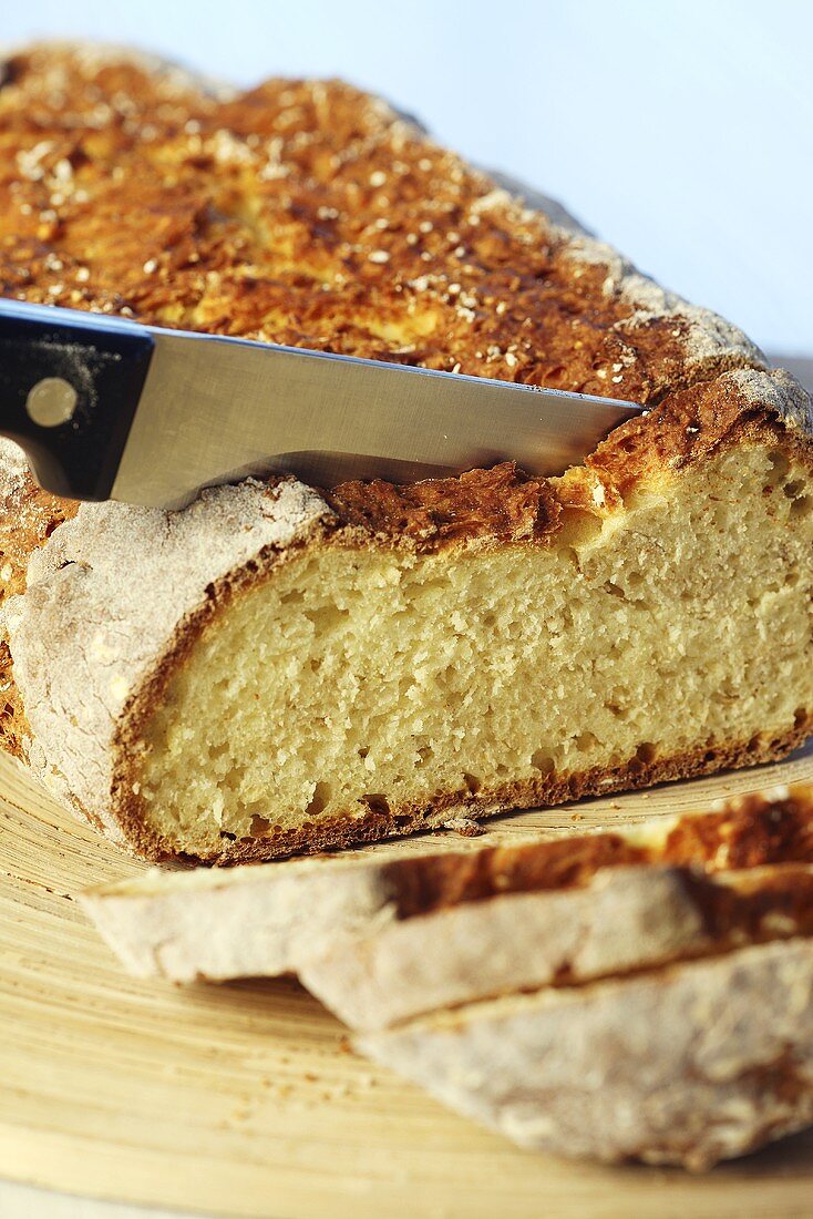 Quark bread, partly sliced