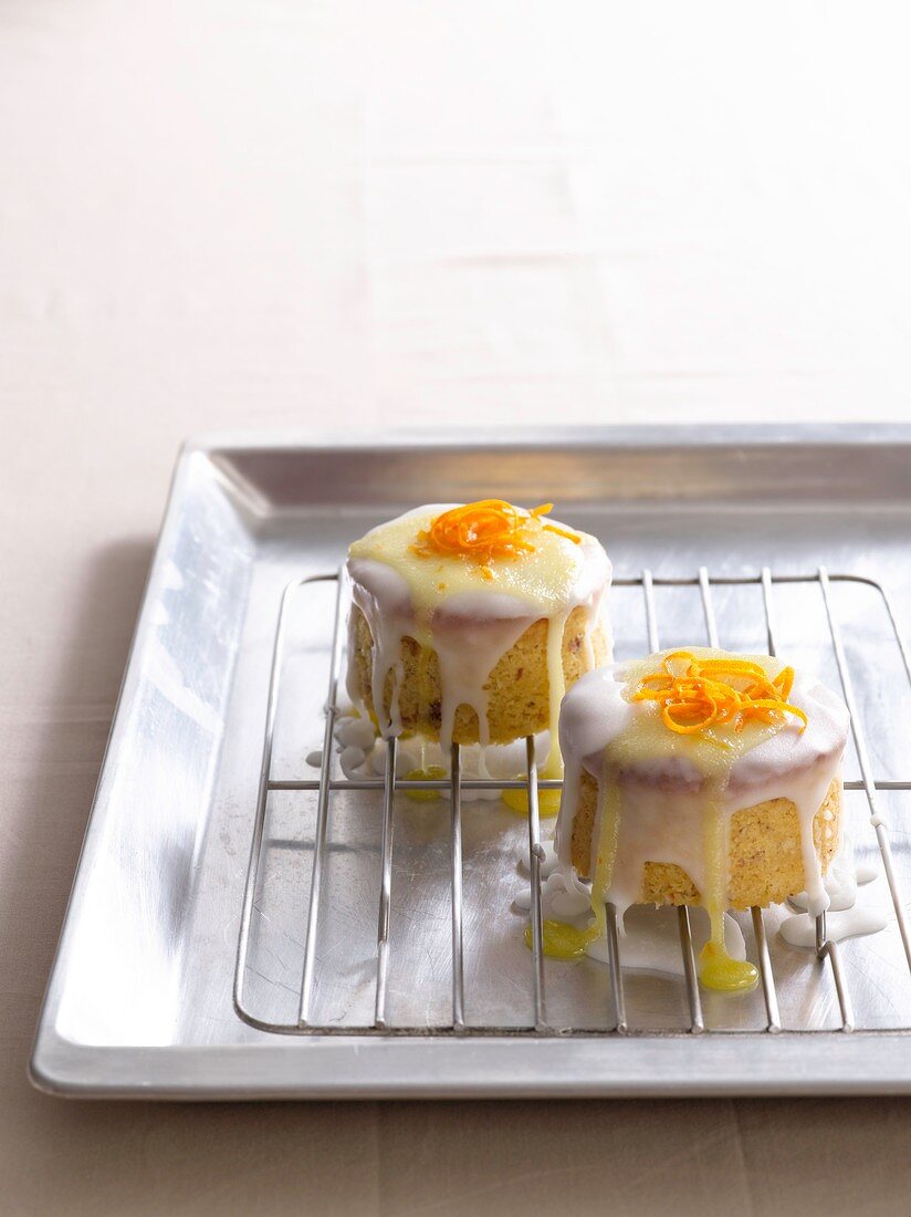 Small almond cakes with orange zest and coconut cream