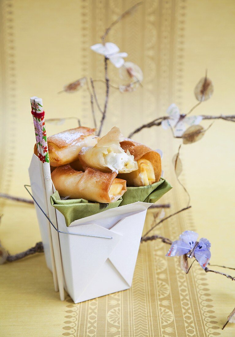 Spring rolls filled with white chocolate and green tea ice cream