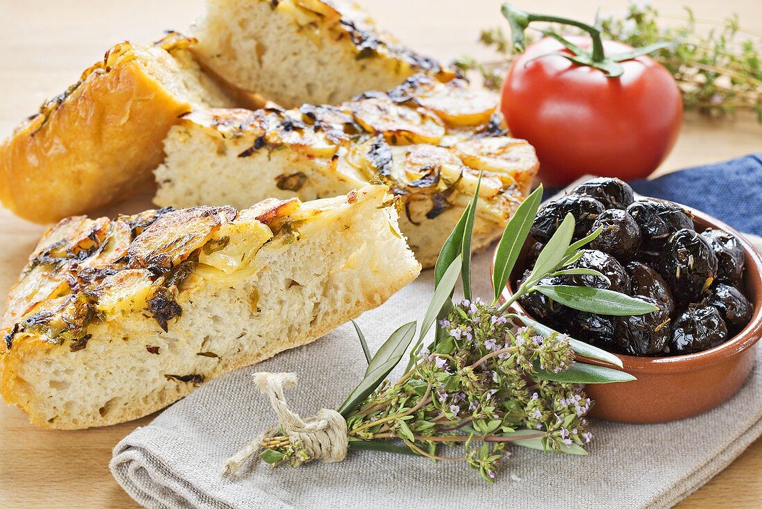 Focaccia with potatoes, olives and thyme