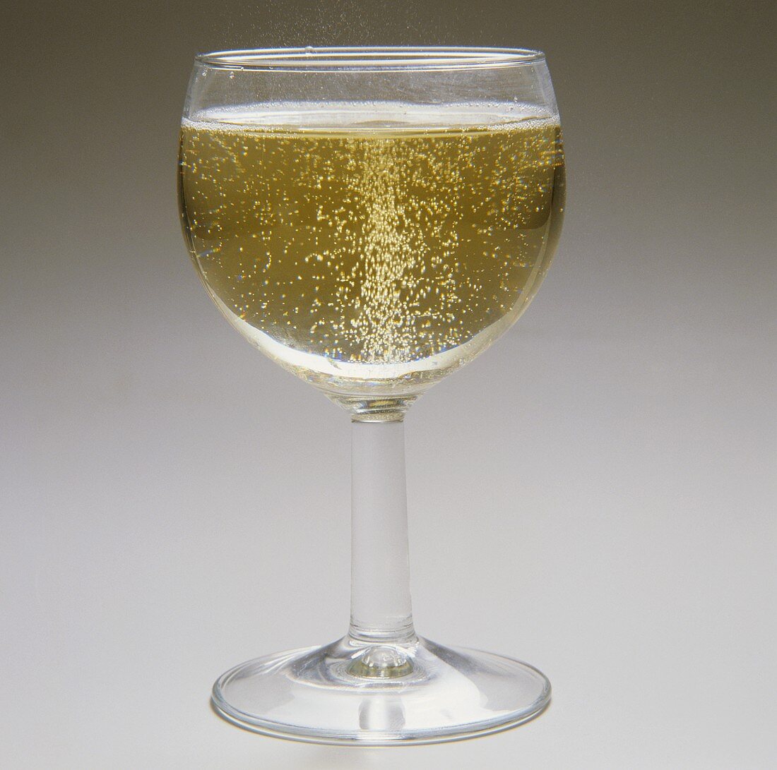 A glass of spritzer (white wine and soda water)