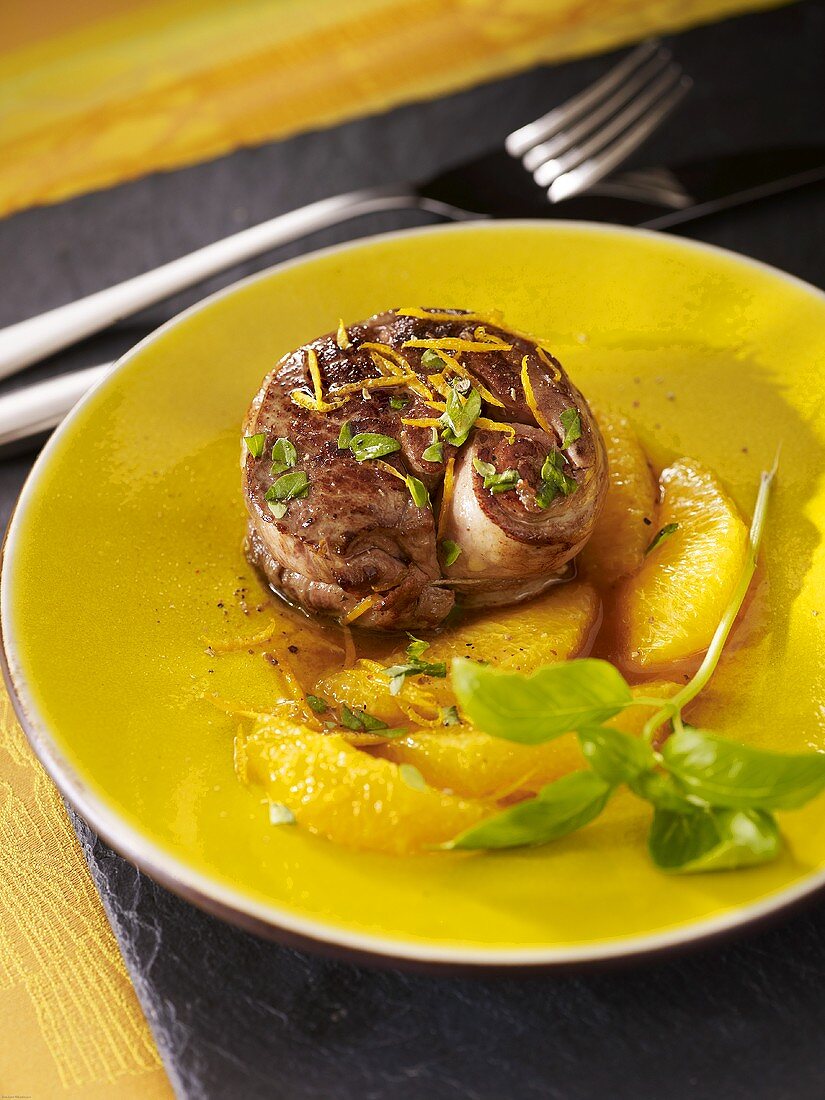 A lamb medallion with oranges and basil