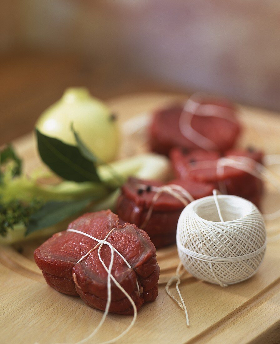 Beef medallions tied with kitchen twine