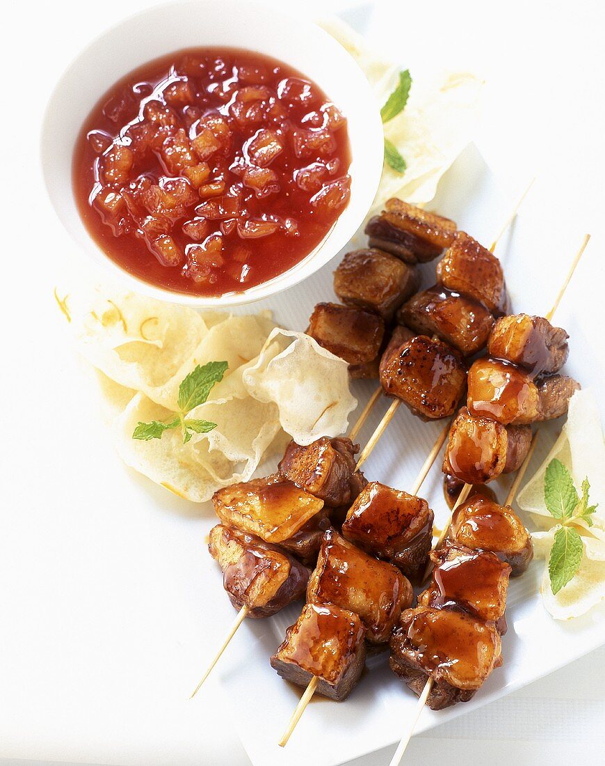 Duck kebabs with pineapple sauce