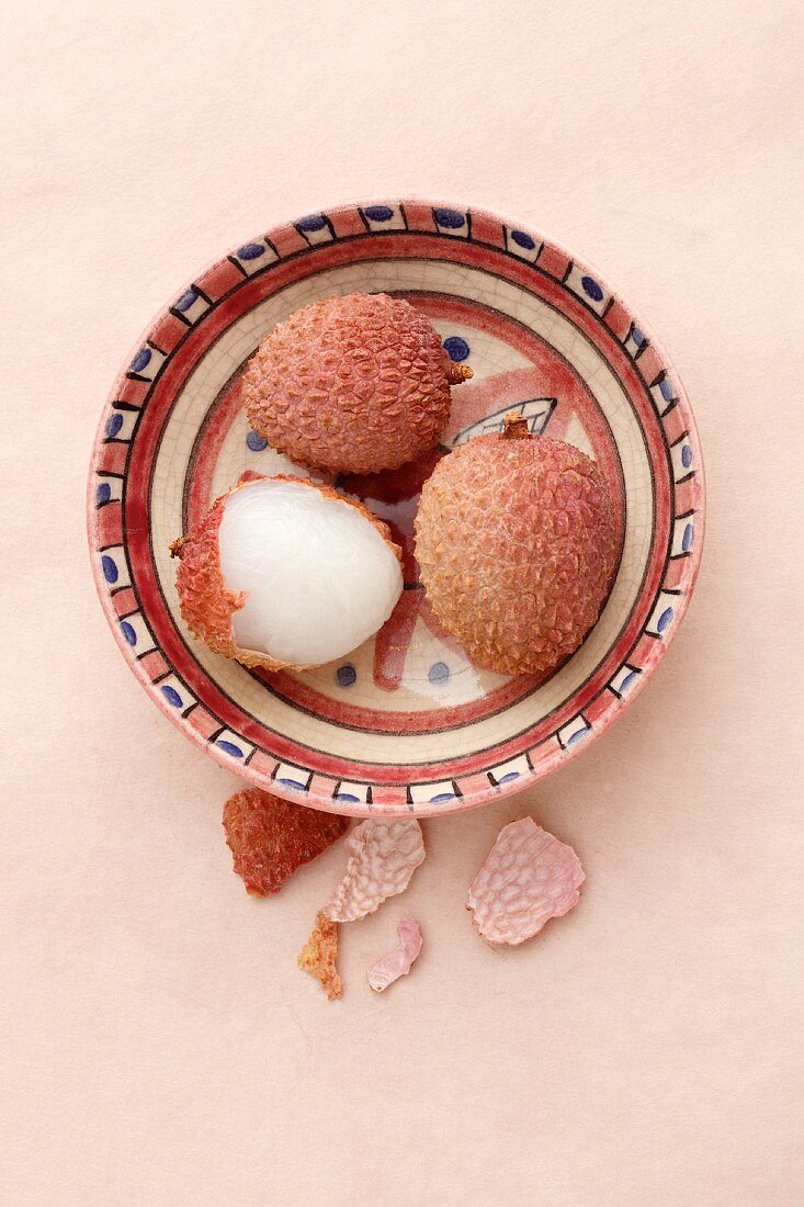 A bowl of lychees, seen from above