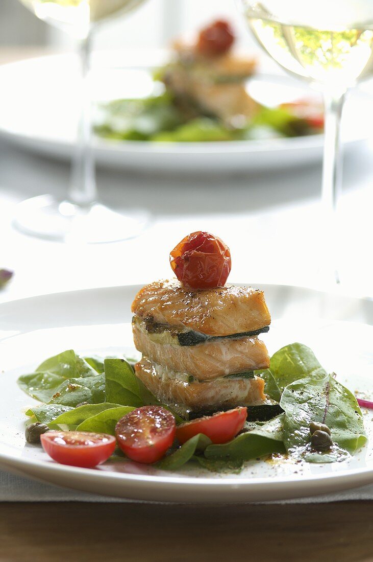 Salmon towers with a tomato and spinach salad