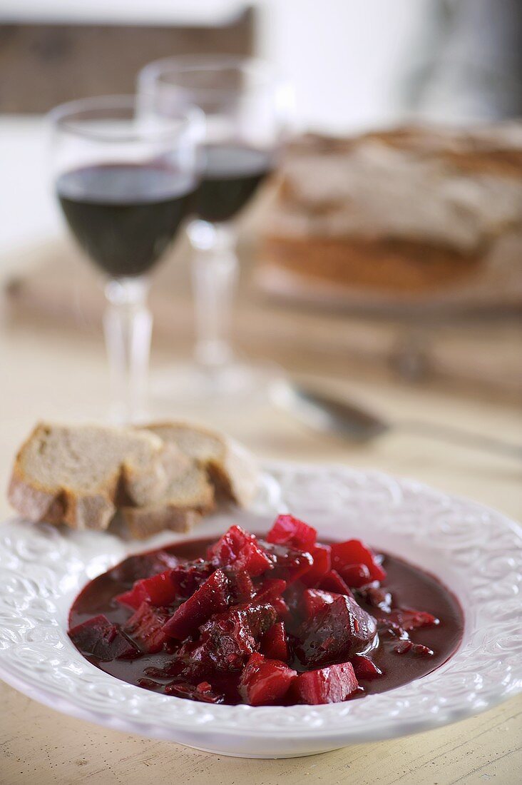 Beetroot stew, bread and red wine