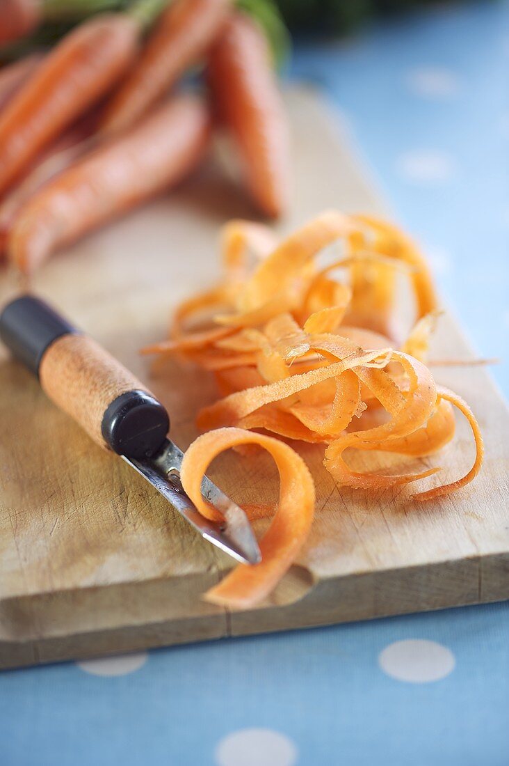 A peeler and carrot skins