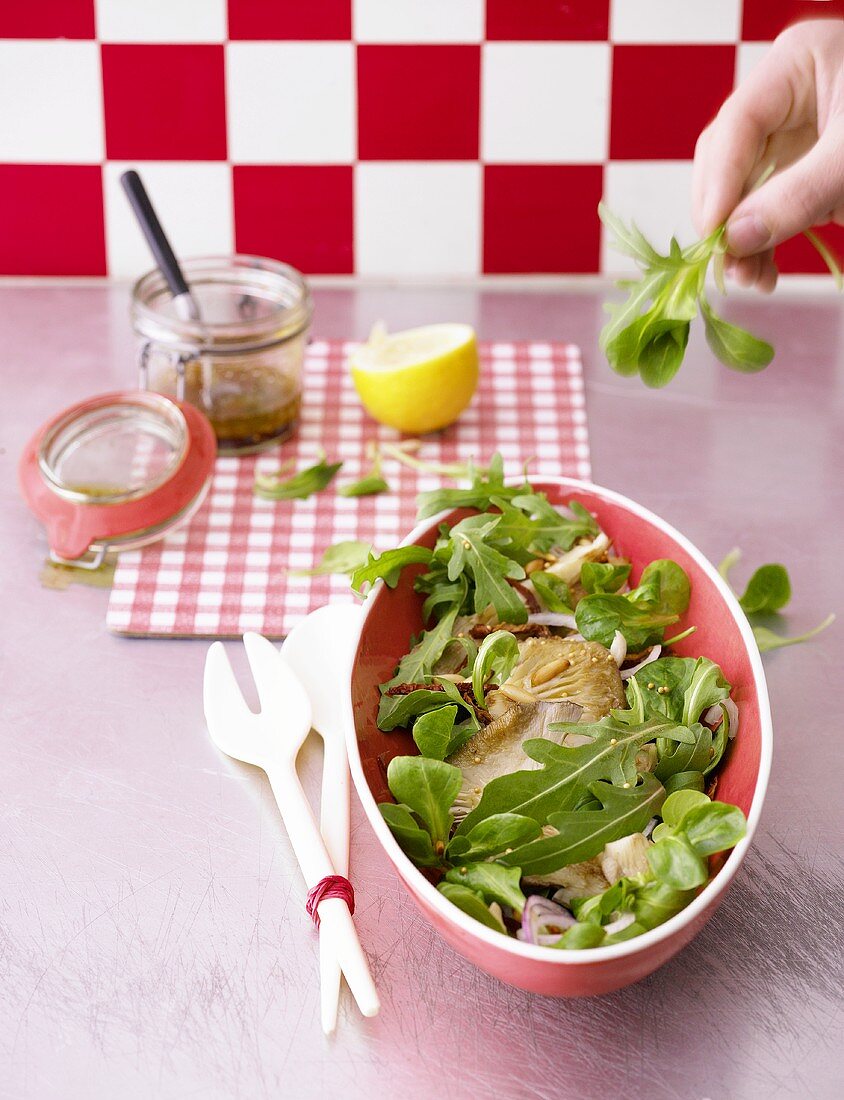 Fried oyster mushrooms with lamb's lettuce and rocket